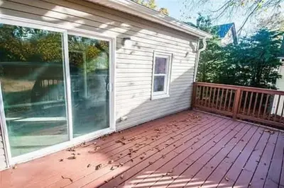 a porch of a house with a large window at 107 Quaint Renovated Single Family 3 Bdrm House in Old Bridge