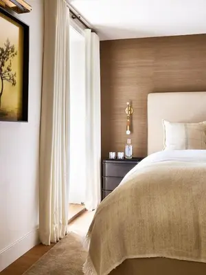 a bedroom with a large bed and a window at Stockton Inn in Stockton