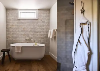 a bathroom with a white bath tub and a sink at Stockton Inn in Stockton