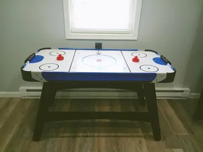 a ping pong table in a room at Cabin near kalahari,camelback Ski in Long Pond
