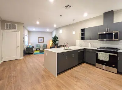 an open kitchen and living room of a apartment at 313 brand new 3 bedroom 2 bath in Dunellen
