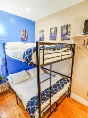 a group of bunk beds in a room at Metropolitan Studio Apartments Manhattan in New York
