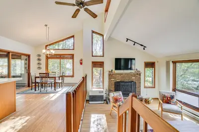 a living room with a fireplace and a tv at Near Water Parks Pet-Friendly Tobyhanna Getaway! in Tobyhanna