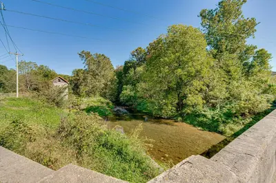 a view of a river from a bridge at Walk to Creek Mount Joy Home with Peacocks On-Site! in Mount Joy