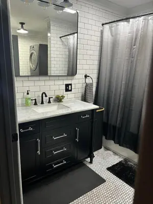 a bathroom with a sink and a shower at the old soda factory in Mount Carmel