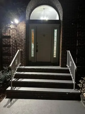a set of stairs leading to a front door at 2000 square feet of comfort and relaxation near NYC in South River