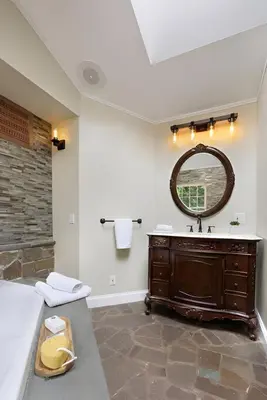 a bathroom with a sink and a mirror at Nature Getaway Charming Villa Near Trails & Parks in Monroe