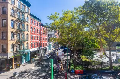 an aerial view of a city street with buildings at Nolita 2br w wd nr SoHo NYC-955 in New York