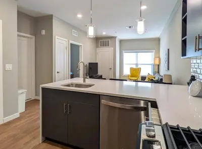 a kitchen with a sink and a counter top at 221 Modern 1BR Apt Walk to NJT in Dunellen