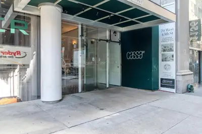 a store front with glass doors on a building at Blueground Midtown gym wd ac nr Rock Ctr NYC-1536 in New York
