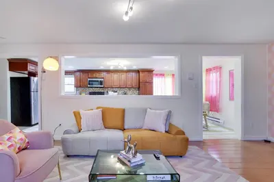 a living room with a couch and a table at 3BD Stevens Universe Theme - Games - Backyard in Tobyhanna
