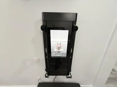 a black soap dispenser in a white wall at The Luxury Suite - 1BR with Gym & Office in Paterson