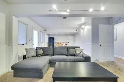 a living room with a couch and a table at Lake Harmony Retreat Perfect Family Getaway in Lake Harmony