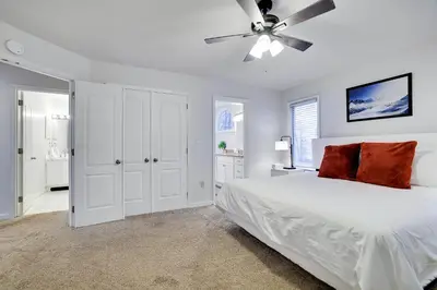 a bedroom with a bed and a ceiling fan at Lake Harmony Retreat Perfect Family Getaway in Lake Harmony