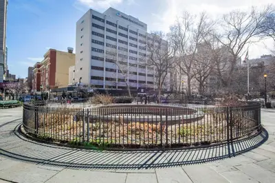 a circular park in the middle of a city at Blueground Gramercy Park 2bd apartment NYC-1616 in New York