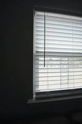 a window with white blinds in a room at Newark Liberty Brick House - Private Bedroom 1 in Newark