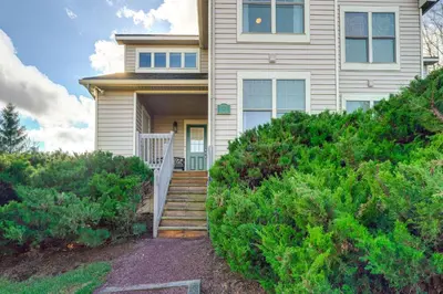 a house with stairs leading to the front door at 1 Mi to Waterpark Mtn-View Poconos Hideaway! in Tannersville