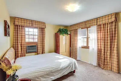 a bedroom with a bed and a window at Monroe Home Near LEGOland and State Parks! in Monroe