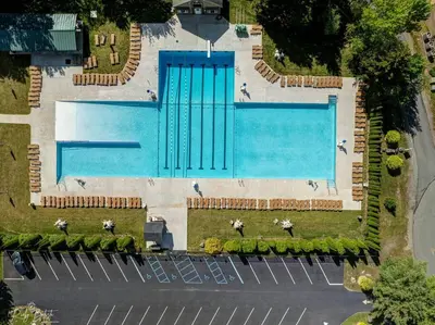 an overhead view of a large swimming pool at Cozy Poconos Retreat Hot tub, Game room and igloo in Tobyhanna