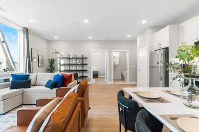 a living room with a couch and a table at Stunning 1-BD - City Views - Near Fishtown in Philadelphia