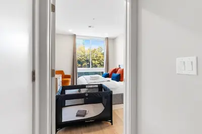 a view of a room with a bed and a window at 1BD Sleeps 4 with Views - Near Fish Town and Old City in Philadelphia