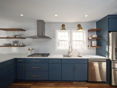 a kitchen with blue cabinets and a sink at The Lambertville Haven in Lambertville