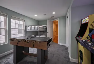 a game room with a ping pong table and a pinball at The Lambertville Haven in Lambertville