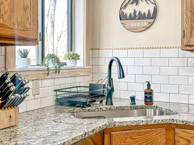 a kitchen counter with a sink and a window at Ski, Unwind, Play Near Big Boulder, Game Room in Blakeslee