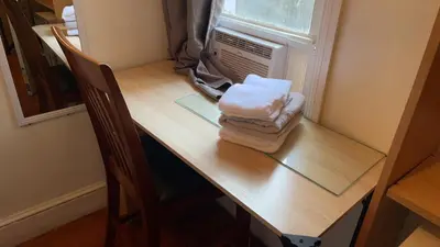 a desk with towels on top of a table at 2218 N Colorado Double Rooms in Eldorado