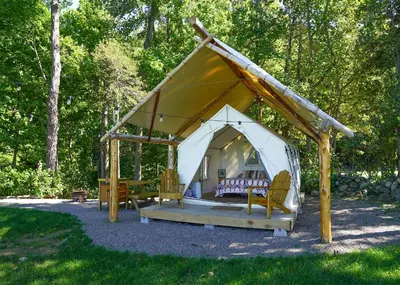 a white gazebo with chairs and a table at Hilltop Hideaway at Moon Valley Campground in Vernon Township