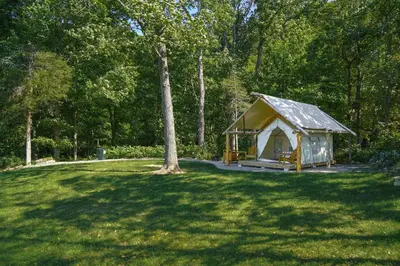 a gazebo in the middle of a grass field at Hilltop Hideaway at Moon Valley Campground in Vernon Township