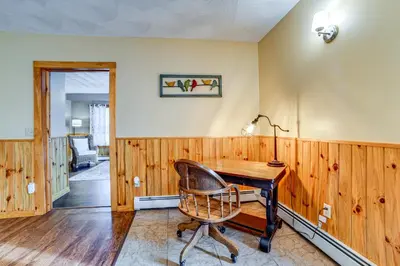 a home office with a desk and a chair at Lisle Apt 4 Mi to Dorchester Lake! in Lisle