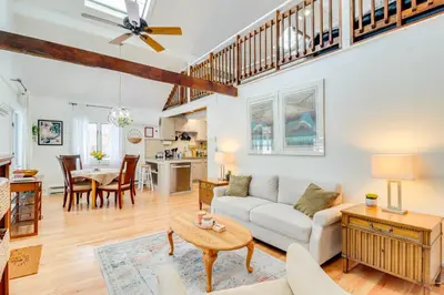a living room with a couch and a table at 8 Mi to Big Boulder Mountain Cabin with Decks! in Albrightsville