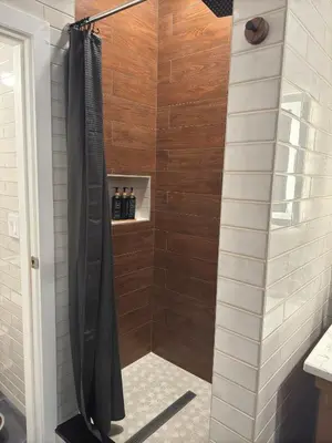 a shower with a black shower curtain in a bathroom at NEW Modern Private Entrance 2 BD Apt Minutes to NYC in Jersey City