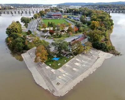 an aerial view of an island in the water at BurgBnB Riverfront in Harrisburg