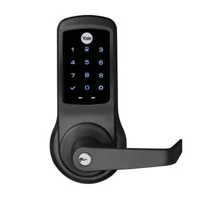a cell phone hooked up to a door handle at 48-3FE 2BR Prime Midtown West in New York