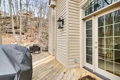 a front porch of a house with a patio at Boulder Lake Access Townhome with Deck! in Lake Harmony