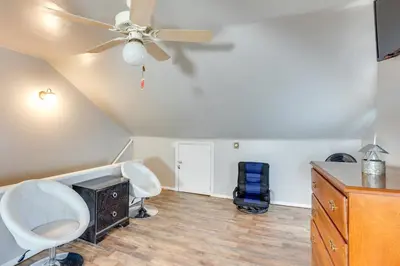 a room with a ceiling fan and a desk at HBG Apt about 3 Mi to Downtown and River! in Harrisburg
