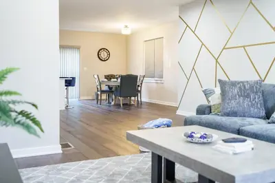 a living room with a couch and a table at Hidden Gem 2 in Norristown