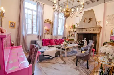 a living room with a couch and a fireplace at One of a kind home with NYC views in Union City