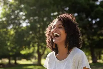 a young girl is laughing with her mouth open at Lovely apartment in New York