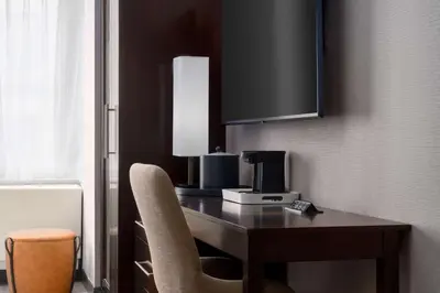 a desk with a coffee maker on it in a room at Hampton Inn Times Square Central in New York