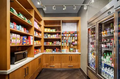 a grocery store aisle with a lot of food at Hampton Inn Times Square Central in New York