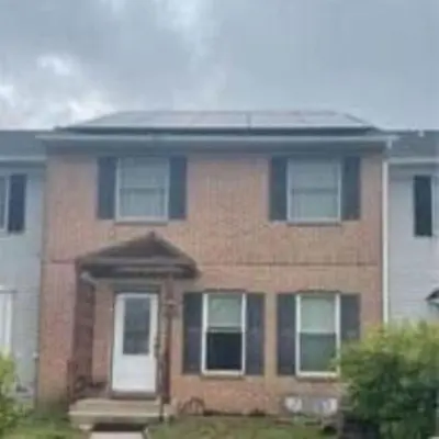 a brick house with a white door and windows at Sweet Home Near Philadelphia in Hatfield