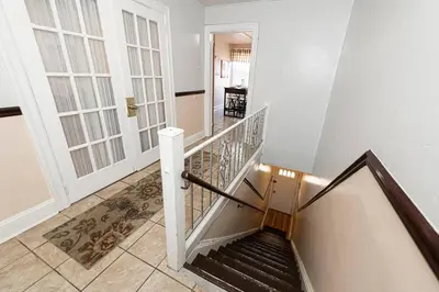 a staircase in a building with a stair case at Restaurants Coffee Colleges Bryn Mawr Has It All in Bryn Mawr