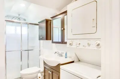a white bathroom with a sink and a toilet at Off The Beaten Path - Choose This Private Gem in Devon