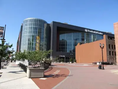 a large glass building in a city at 20 MIN to Manhattan! 2BR Luxurious Comfy & Spotless in Newark