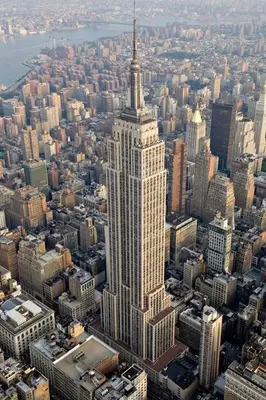an aerial view of the empire state building at Chelsea Gem Modern 2BR Apt Prime 23rd & 7th Spot in New York