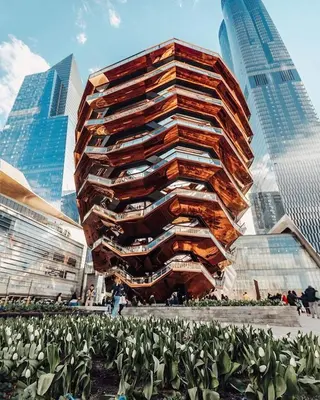a building in a city with tall buildings at Chelsea Gem Modern 2BR Apt Prime 23rd & 7th Spot in New York