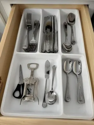 a white tray filled with silver utensils at Near New York-EWR-JG Mall-Train - Elizabeth NJ in Elizabeth